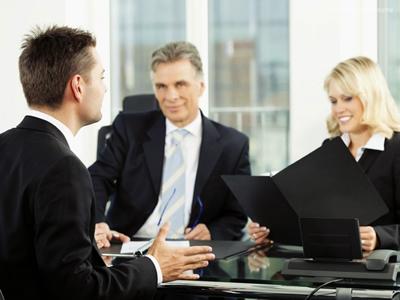 Handwriting Analysis Services for Business Photo of a business interview.